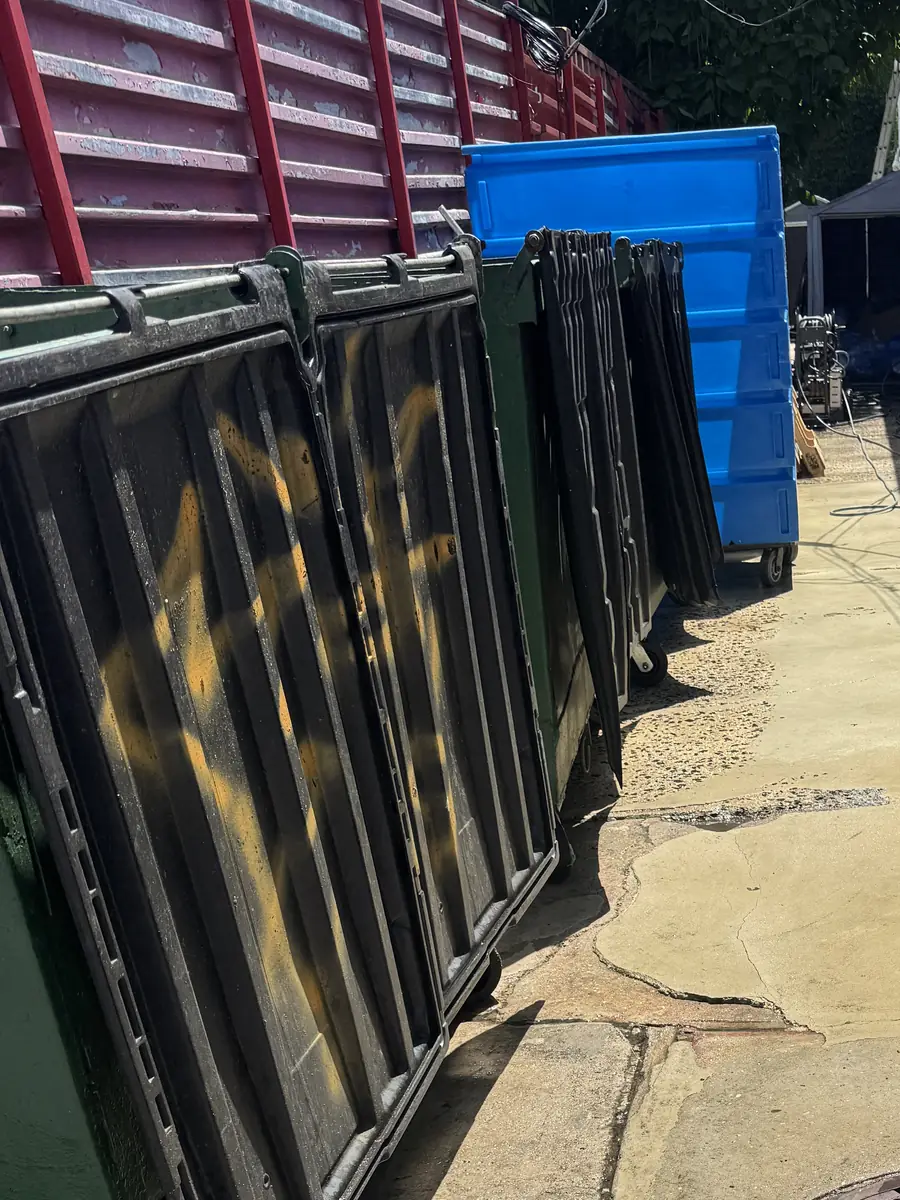 Rear commercial service area documented during sanitation work